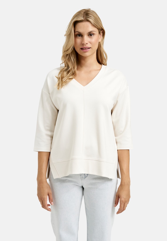 sweatshirt w v-neck, slits, 3/4 sleeves, cuff at hem sweatshirt w v-neck, slits, 3/4 sleeves, cuff at hem