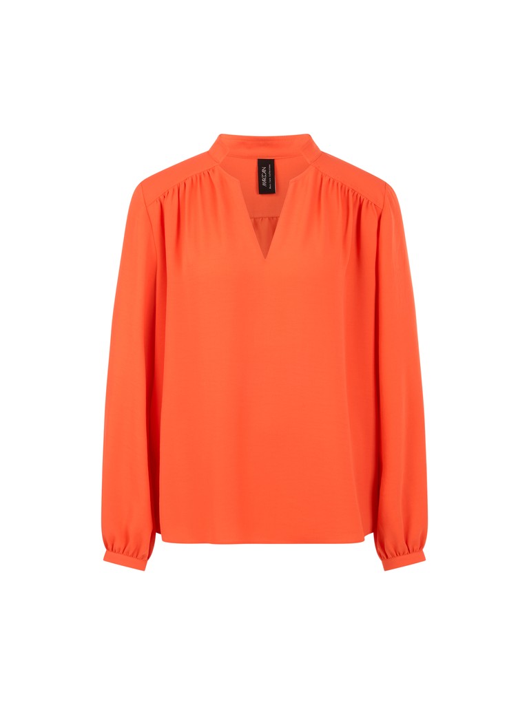Fließende Bluse mit Schmuckknopf